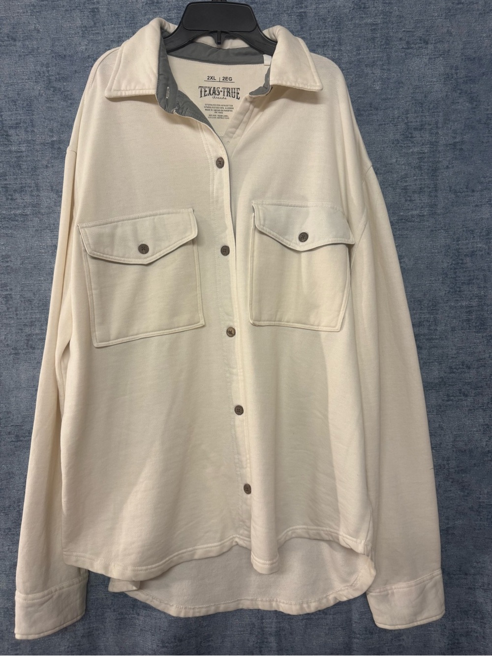 Women’s cream colored button up collar shirt. Size 2X